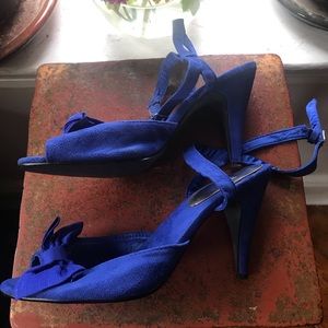 Blue suede bow tie heels